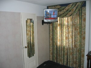a tv mounted on the wall