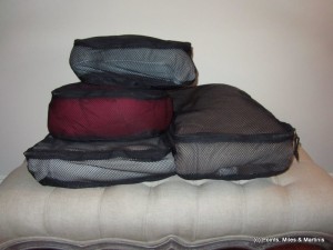 a stack of black and red bags
