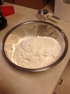 a bowl of flour on a counter