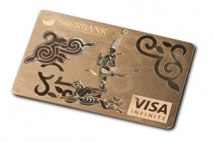 a gold card with a design on it