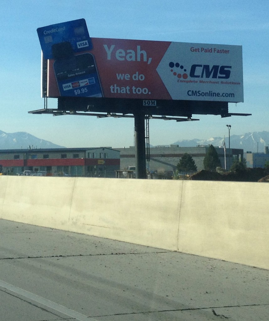 a billboard on the side of a road