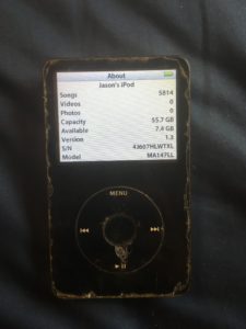 a black music player with a screen