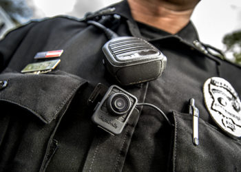 a police officer with a camera on his chest