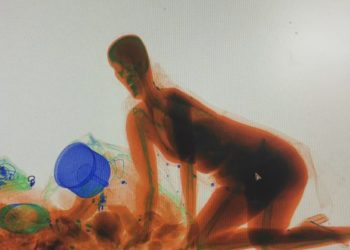 a x-ray of a woman kneeling on the ground