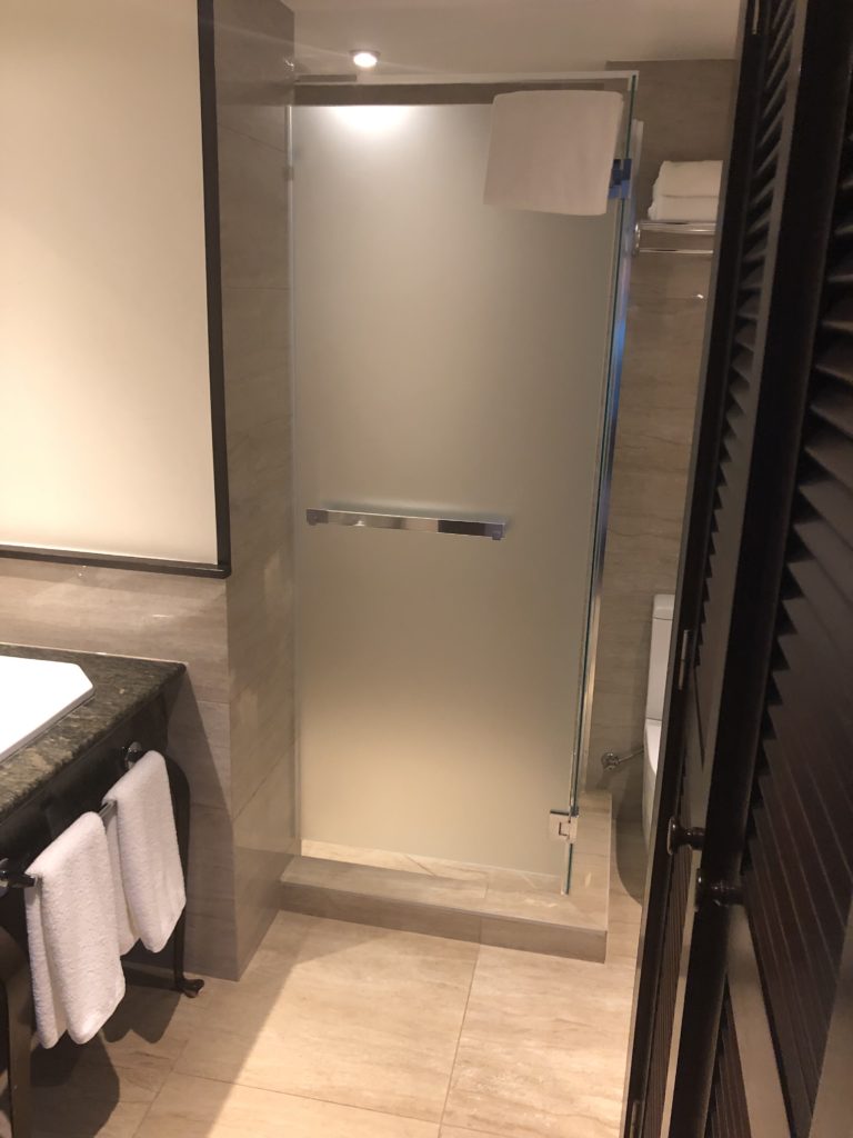 a bathroom with a glass shower