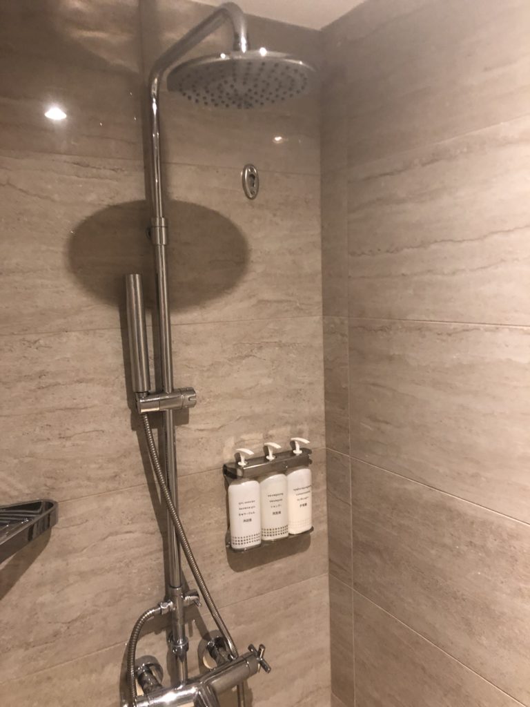 a shower with a shower head