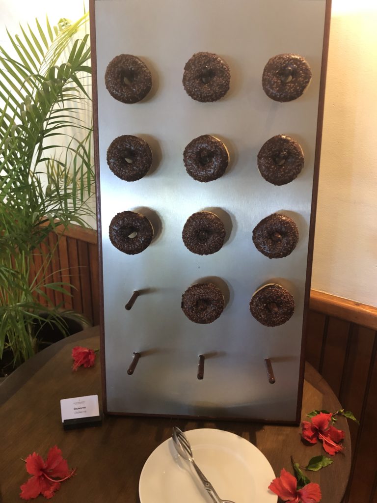 a wall of donuts on a table