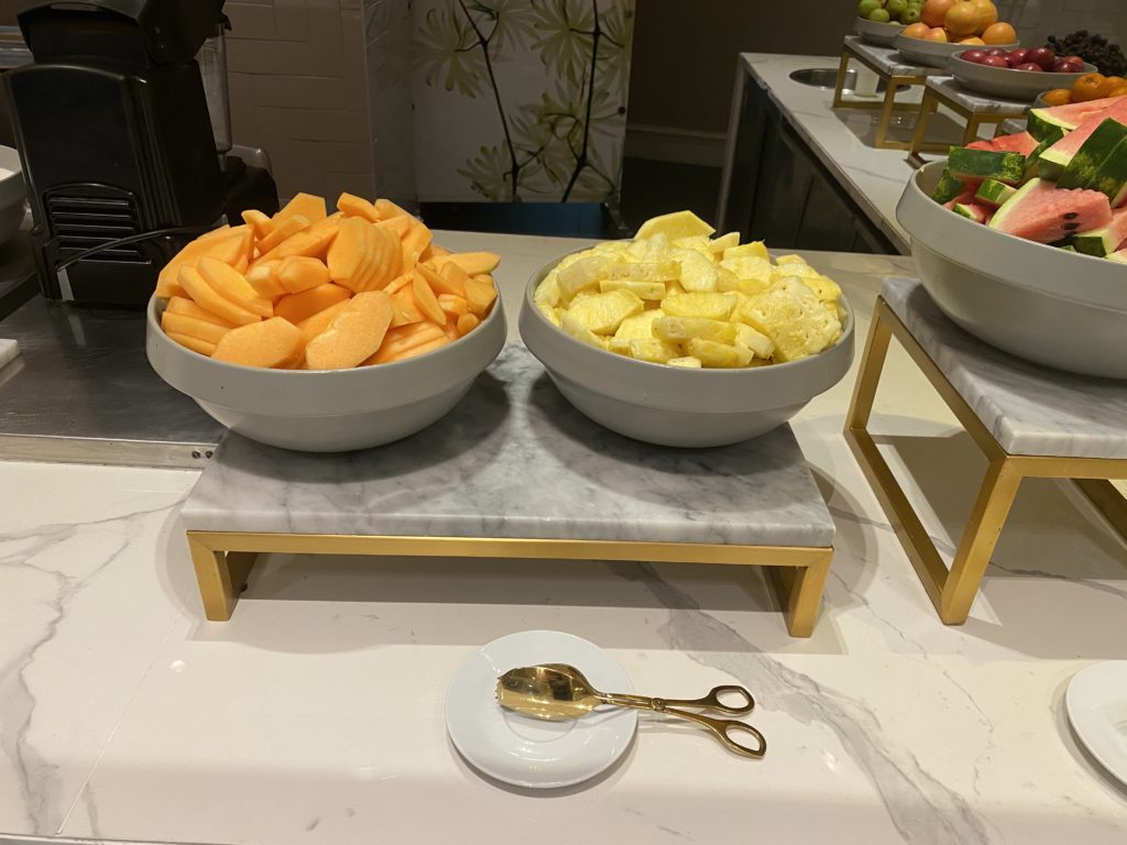 a bowl of fruit on a counter
