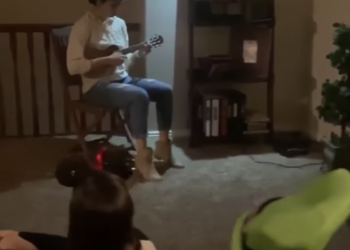 a person playing a guitar