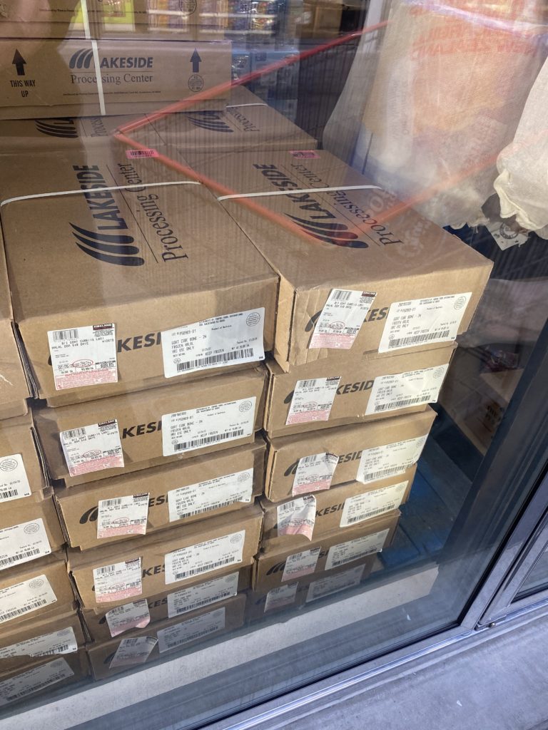 a stack of boxes in a window
