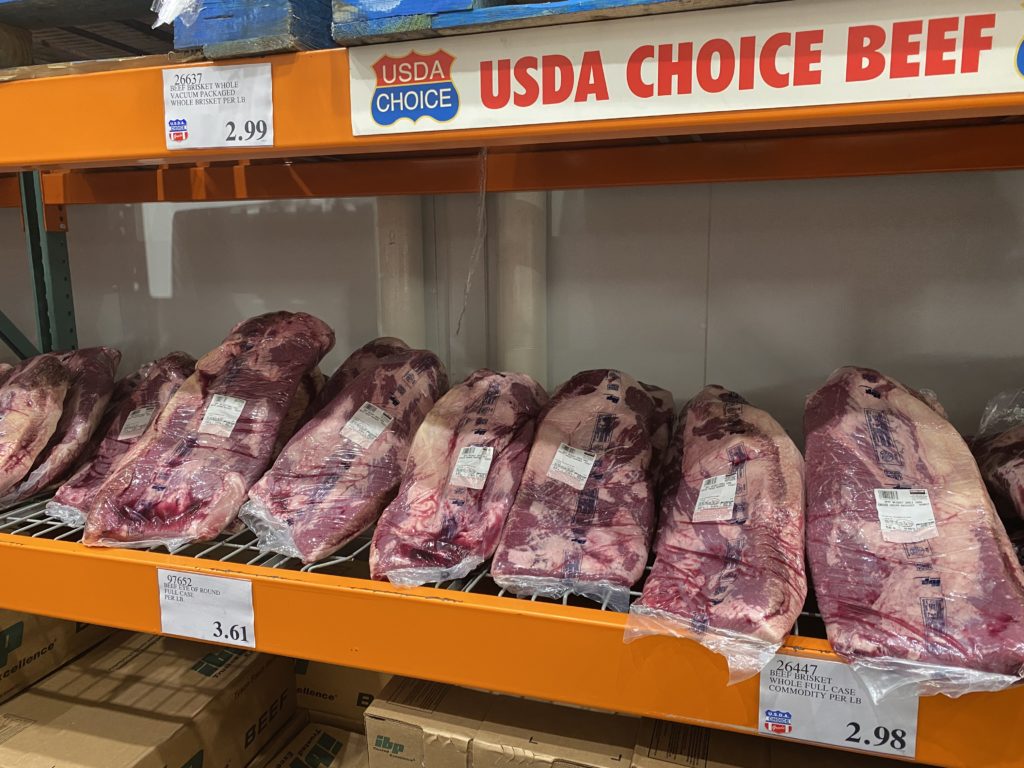 meat on a shelf in a store