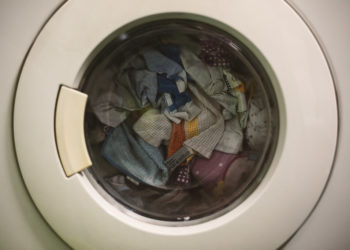 a washing machine with clothes in it