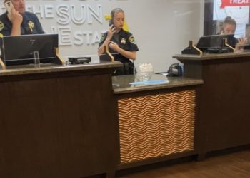 a police officers at a reception desk