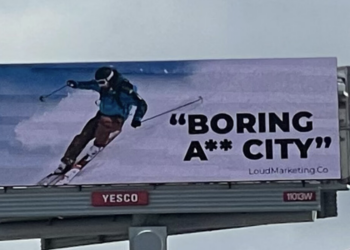 a billboard with a person skiing