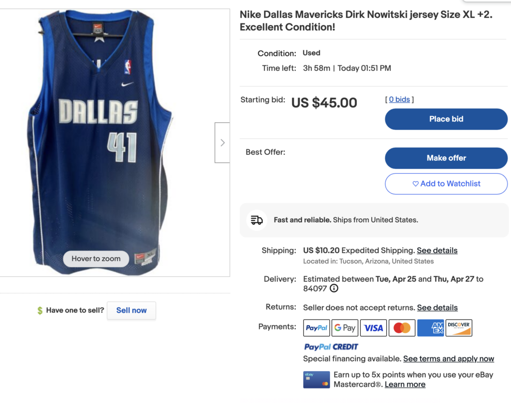 a blue basketball jersey with white text