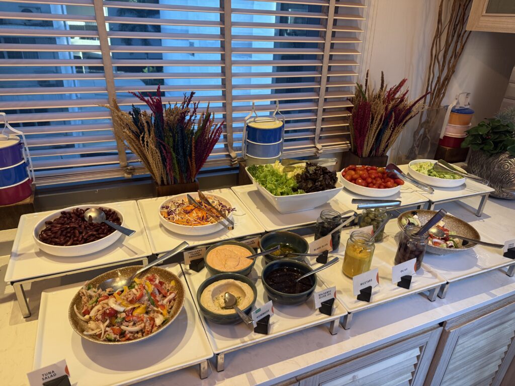 a buffet table with different food items on it