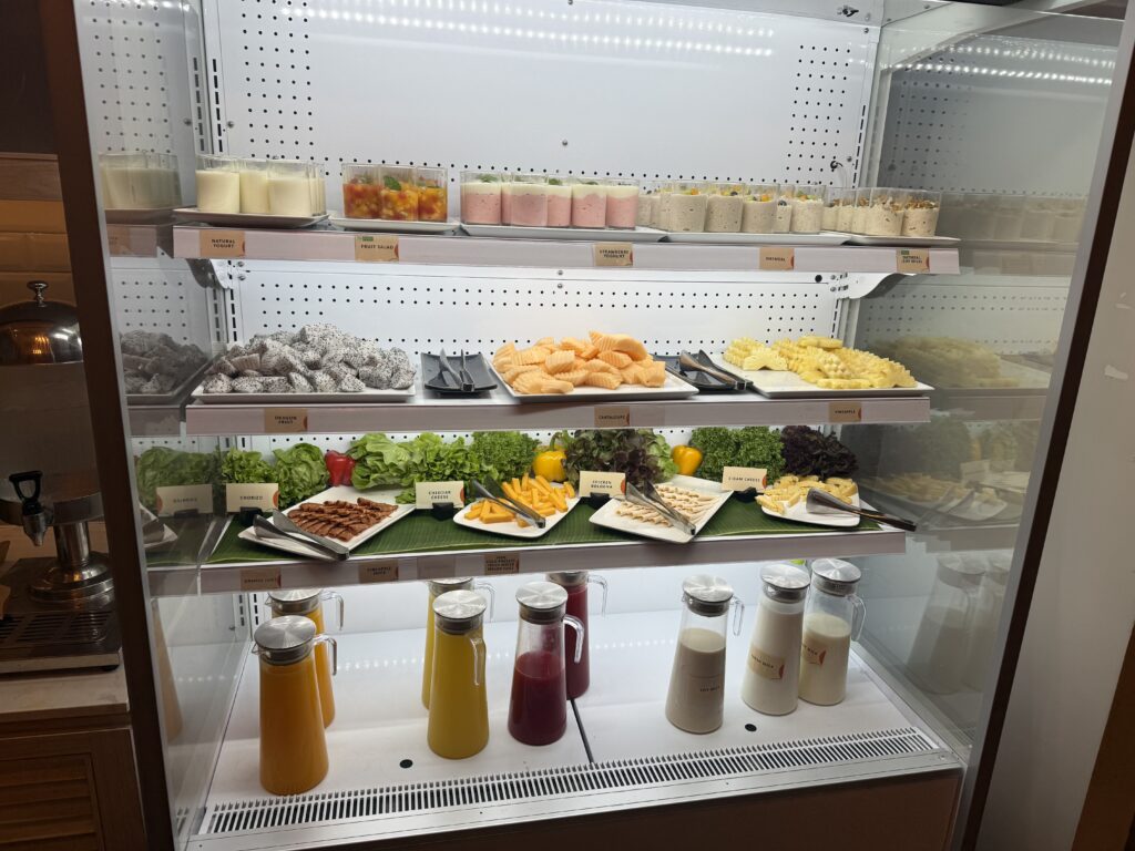 a display case with food on shelves